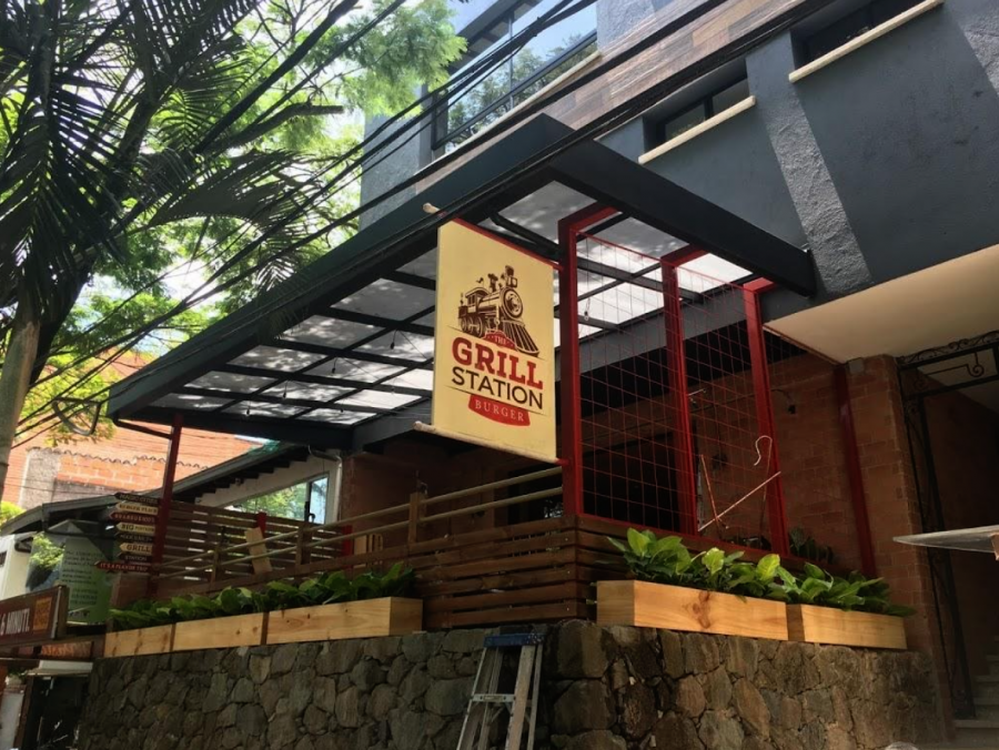 Grill Station Burger in Provenza, El Poblado, located on the second floor. Grill station placed #1 in Burger Master 2019 and is considered to have the best burgers in Medellin.