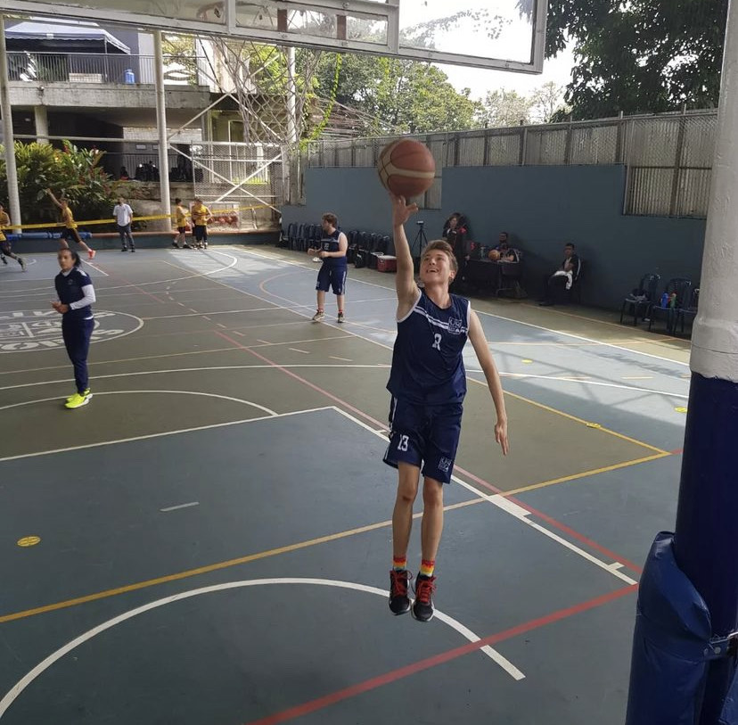 A player form Colegio Bolivar player warms up before a game at the ACCSS Tournament in Cali March 16-19.
