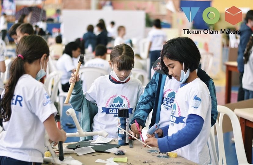 Makers of “Makecamp” working on their designs in the 2019 TOM event.
