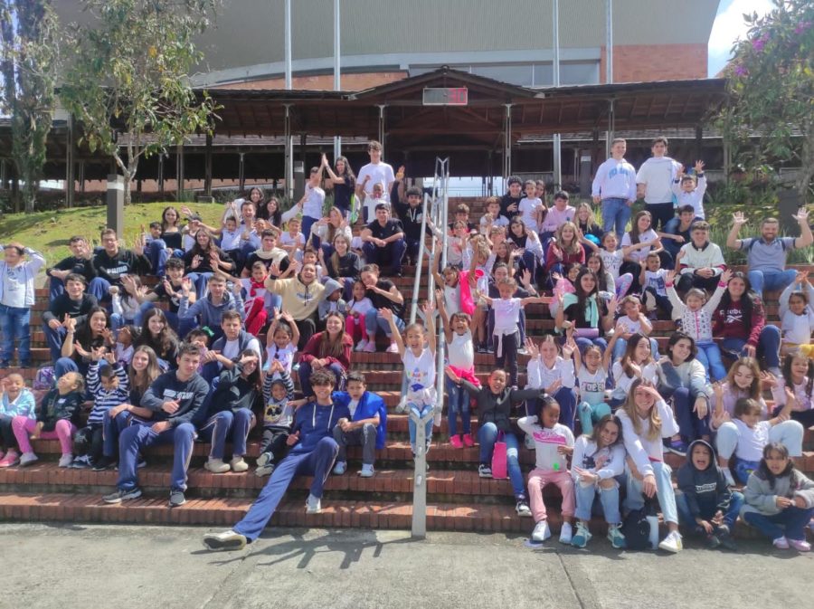 TCS students celebrate  a successful day entertaining children from Fundacion Dame la Mano.
