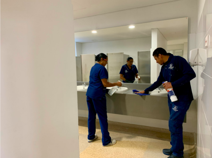 They are our schools hidden guardians making sure that each classroom, hallway, and common area is tidy, welcoming, and prepared for learning. Here, they work in the downstairs bathroom after school, ensuring that we enjoy a pristine and well-maintained space.