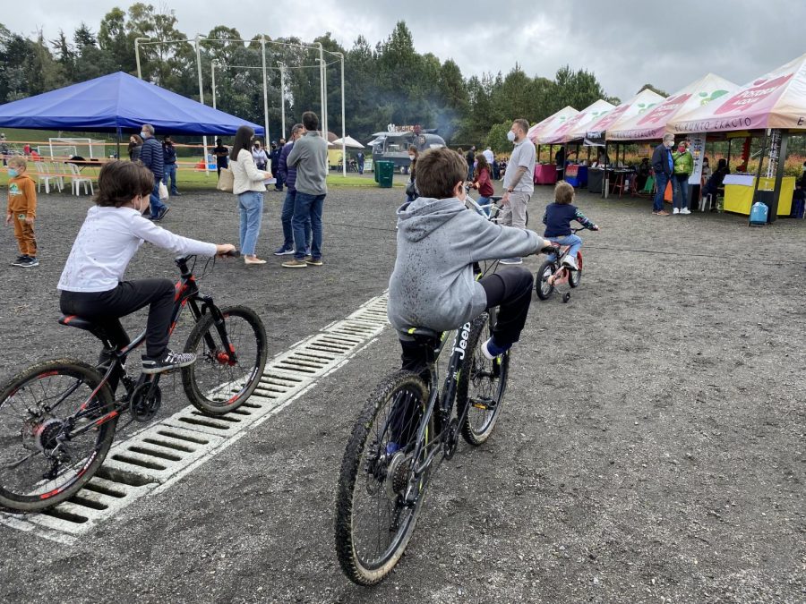 TCS ride their bikes on the track during the Candle Day celebration. This was the first event held at TCS since the COVID pandemic began in early 2020.