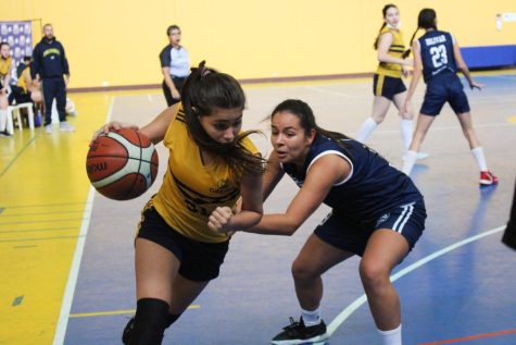 TCS basketball player Sara Galeano in action against Colegio Bolivar  during Binationals.