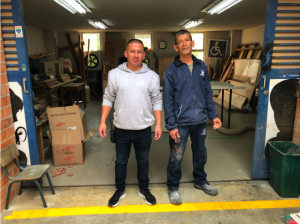 Andres Montoya, chief of the maintenance section, and his co-worker Mora, the one in charge of the carpentry, are working together for makerspace materials and furniture.