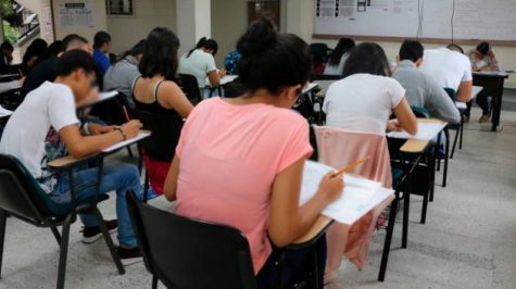 Students from all over Medellin gathering at Institución Educativa INEM José Félix De Restrepo about to start their exam.